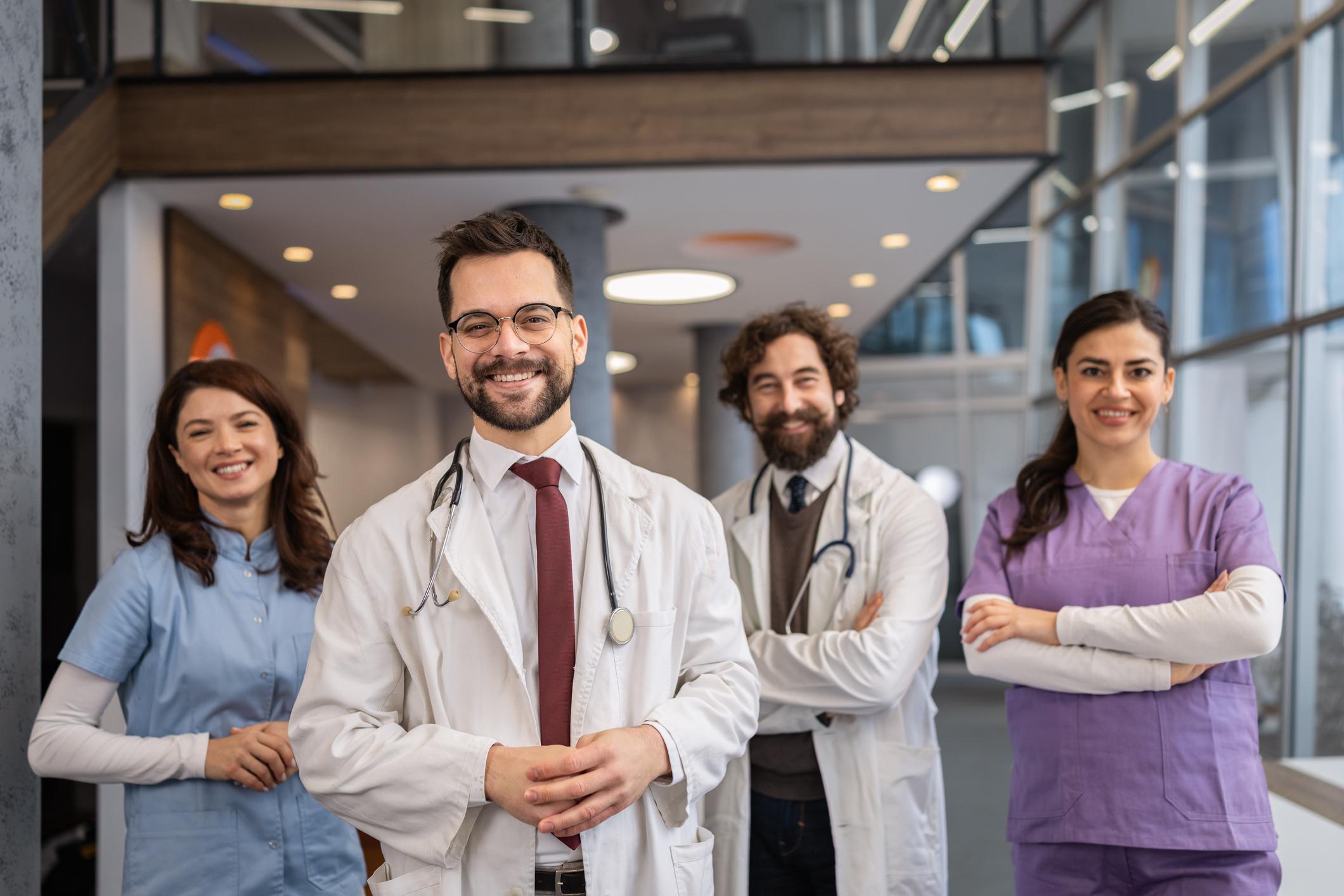 Healthcare professionals consulting with a patient