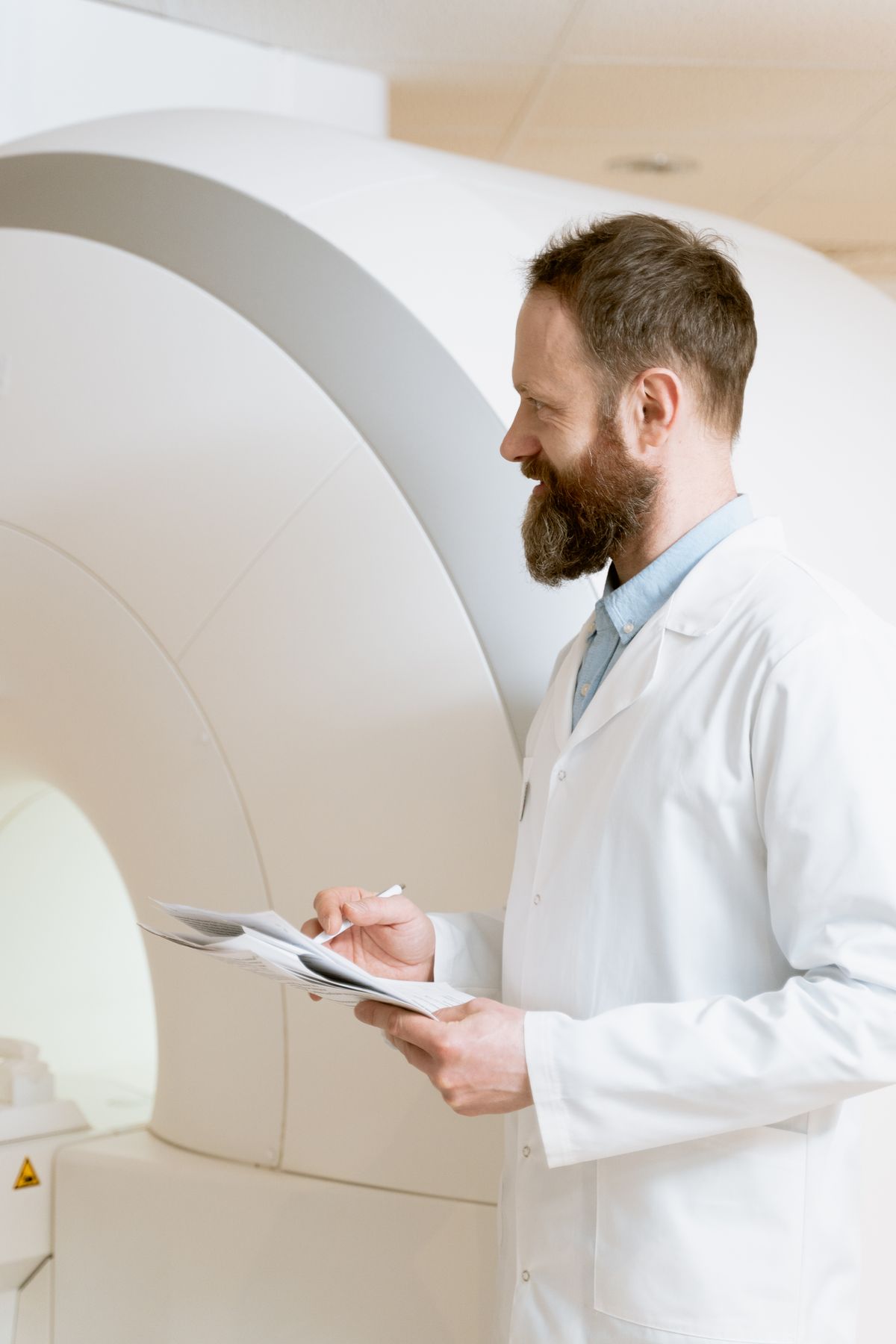 Physician reviewing MRI scan results in a clinical setting